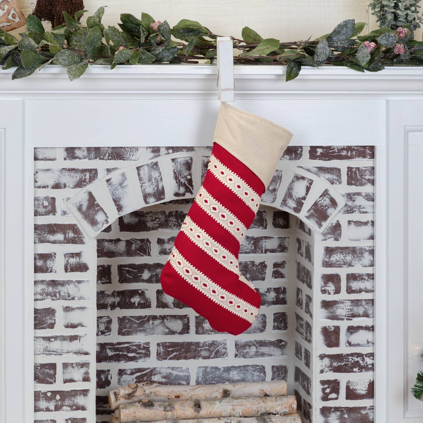 red Christmas stocking with cream colored lace trim